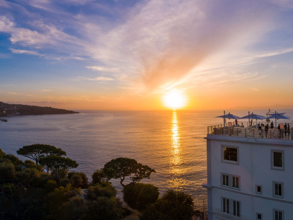 Luxury hotel in Sorrento with sea view over the Bay of Naples at sunset, Hotel Mediterraneo